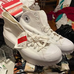 Brand new white converse with platform bottom. Men’s 10. Women’s 12.